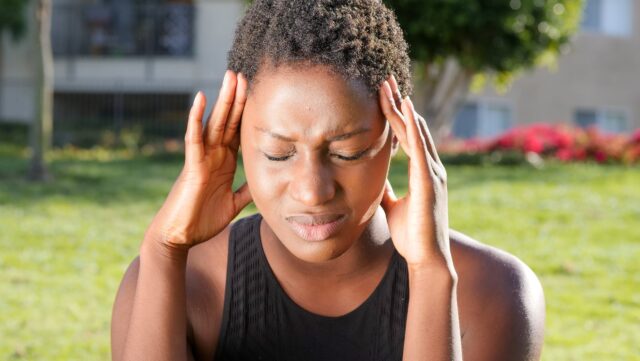 pexels-photo-7298673 woman in pain due to headache