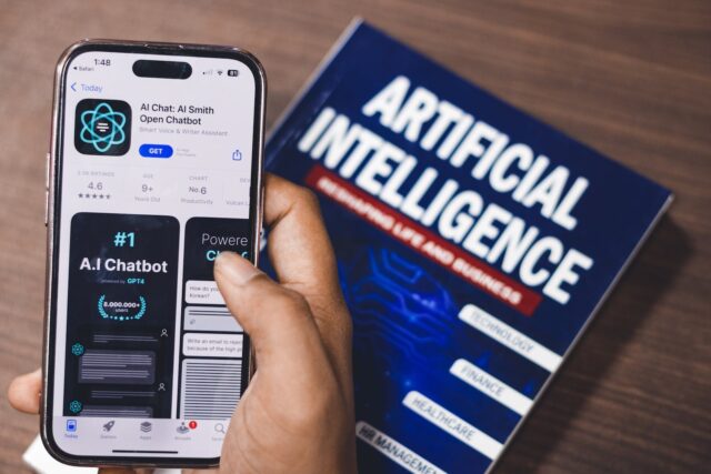 Photo by Sanket Mishra Webpage of Ai Chatbot, a prototype AI Smith Open chatbot, is seen on the website of OpenAI, on a apple smartphone. Examples, capabilities, and limitations are shown.