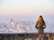 Top 10 Ways to Overcome Travel Anxiety blonde, sitting, wall