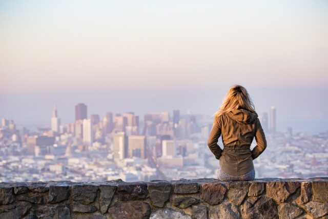 Photo by Pexels blonde, sitting, wall