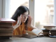 Migraine vs. Headache: Understanding the Difference A Weary Female Student Having a Headache