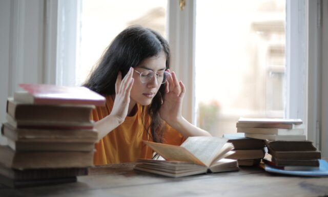 Photo by Andrea Piacquadio A Weary Female Student Having a Headache