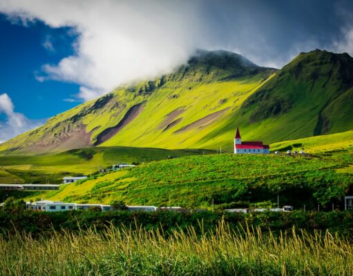 Top 10 Iceland Destinations to Travel in 2024 Green Field Near Mountain During Daytime