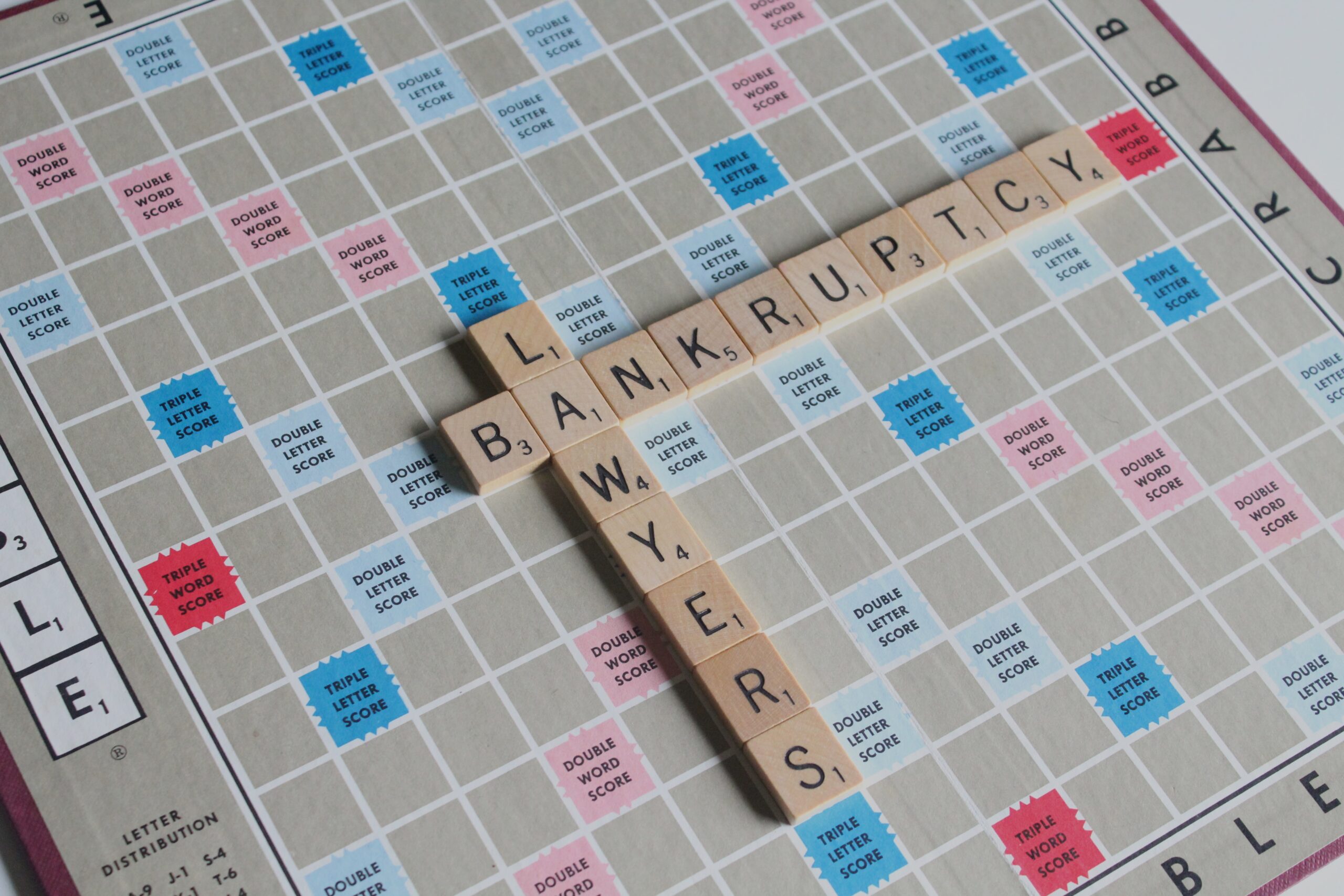 closeup photo of scrabble closeup photo of scrabble game board