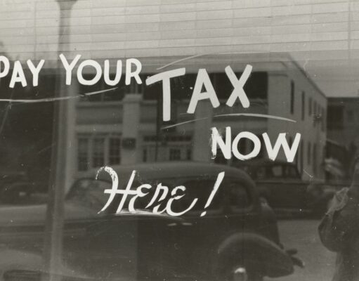 Top 10 Tax Deductions for Self-Employed Workers in the United States a sign that says pay your tax now here