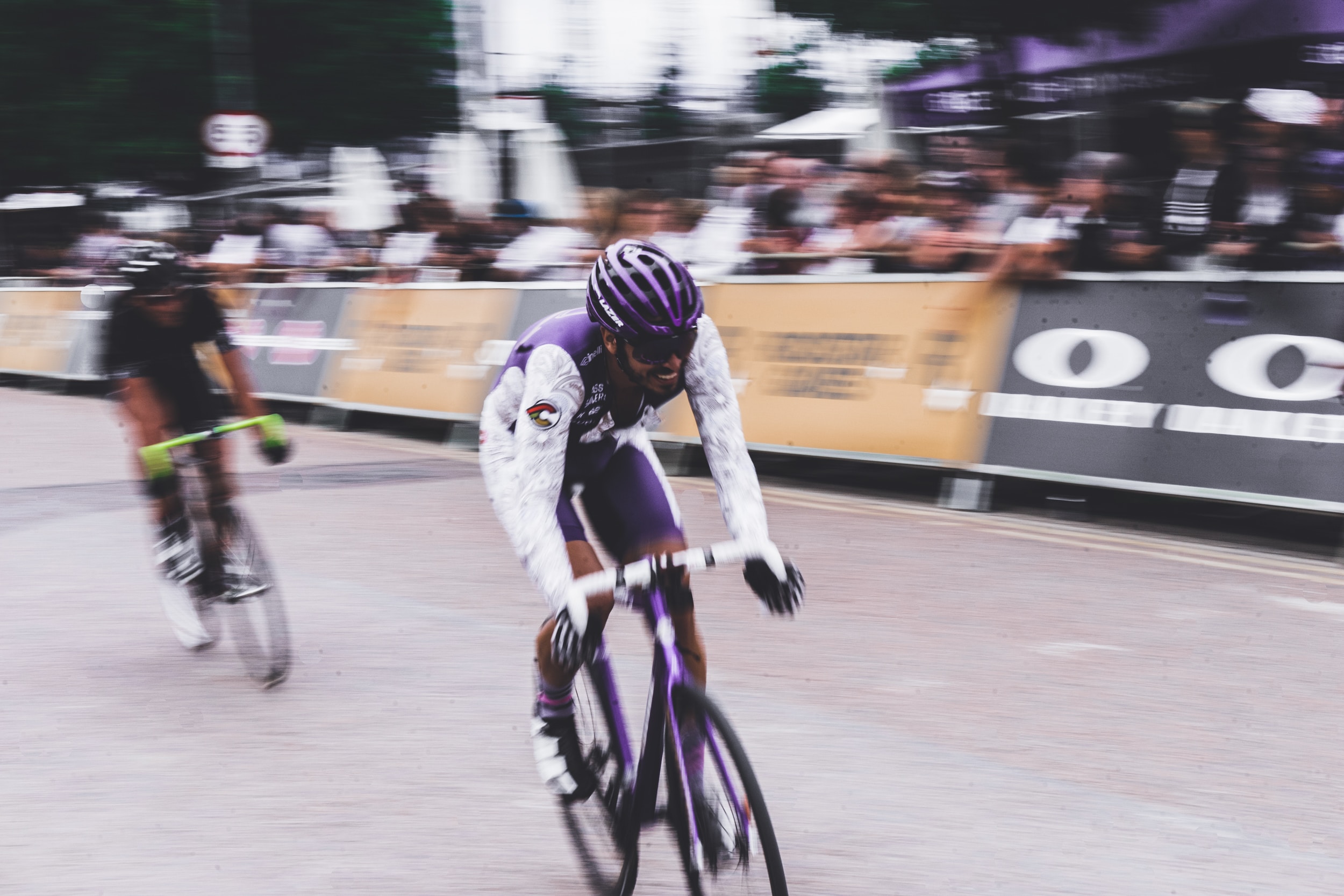 two men bike racing two men bike racing during daytime